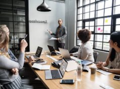 No-Code Stack for B2C App Landing Pages Group of diverse people having a business meeting